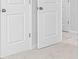 Neutral bedroom featuring carpeted floors, white walls, and white doors at 3021 Cambridge Mill St, Acworth, GA 30102