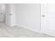 Neutral bedroom featuring carpeted floors, white walls, and white doors at 3021 Cambridge Mill St, Acworth, GA 30102