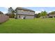 Expansive backyard with lush green grass, offering ample space for outdoor activities and relaxation at 577 Joneus Dr, Mcdonough, GA 30252