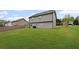 Expansive backyard with lush green grass, offering ample space for outdoor activities and relaxation at 577 Joneus Dr, Mcdonough, GA 30252