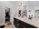 Bathroom boasts double sinks, marble counters, with a door leading to the closet at 577 Joneus Dr, Mcdonough, GA 30252