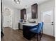 Eat in Kitchen with marble countertop, dark cabinets and stainless steel appliances at 577 Joneus Dr, Mcdonough, GA 30252