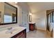 Bathroom featuring a single sink, tile floor, and a glass-enclosed shower, soaking tub at 1205 Apple Blossom Dr, Cumming, GA 30041
