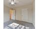 Cozy bedroom with carpeted floors and natural light from a window at 1205 Apple Blossom Dr, Cumming, GA 30041