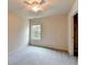 Bright bedroom with a ceiling fan and window view of the outdoors at 1205 Apple Blossom Dr, Cumming, GA 30041