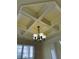 Decorative ceiling detail including multi-paneled design and modern chandelier at 1205 Apple Blossom Dr, Cumming, GA 30041