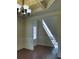 Dining room boasting dark wood floor, wainscoting, and abundant natural light at 1205 Apple Blossom Dr, Cumming, GA 30041