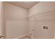 Small laundry room featuring a shelf and hookups for appliances at 1205 Apple Blossom Dr, Cumming, GA 30041