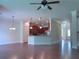 Spacious open-concept living and kitchen area with hardwood floors and lots of natural light at 1205 Apple Blossom Dr, Cumming, GA 30041