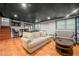 Basement living room area offers a bar, seating, and a large TV for entertaining at 2240 Murdock Rd, Marietta, GA 30062