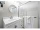 Bathroom with glass enclosed shower, modern fixtures, a white vanity, and a large mirror at 2240 Murdock Rd, Marietta, GA 30062