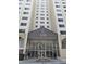 Exterior shot of the Park Lane 2479 building entrance with its glass doors and covered entryway at 2479 Peachtree Ne Rd # 902, Atlanta, GA 30305