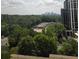 Beautiful city skyline view from this high-rise apartment overlooking lush green treetops at 2479 Peachtree Ne Rd # 902, Atlanta, GA 30305