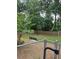 Dog park with a bench for owners to relax at 2479 Peachtree Ne Rd # 902, Atlanta, GA 30305