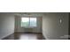 Living room with large window featuring a city view at 2479 Peachtree Ne Rd # 902, Atlanta, GA 30305