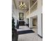 Grand entrance featuring a chandelier, tiled floors, a mirror and plenty of natural light at 2479 Peachtree Ne Rd # 902, Atlanta, GA 30305