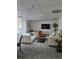 Cozy lounge area featuring comfortable seating and a television at 2479 Peachtree Ne Rd # 902, Atlanta, GA 30305