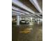 A well-lit parking garage with designated parking spots for residents at 2479 Peachtree Ne Rd # 902, Atlanta, GA 30305