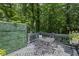Outdoor deck provides an ideal space for relaxing with outdoor dining at 3648 Sope Creek Farm Se, Marietta, GA 30067