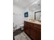 Full bathroom with dark wood vanity and decorative rug at 3648 Sope Creek Farm Se, Marietta, GA 30067