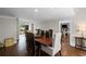 Dining room with hardwood floors, large windows and an adjacent formal living room at 3648 Sope Creek Farm Se, Marietta, GA 30067