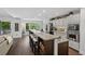 Bright kitchen with a breakfast bar and an abundance of cabinet space and a view of the deck at 3648 Sope Creek Farm Se, Marietta, GA 30067
