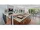 Open concept kitchen with granite countertops, a breakfast bar, and stainless steel appliances at 3648 Sope Creek Farm Se, Marietta, GA 30067