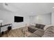 Cozy living room with hardwood floors and comfortable, oversized sectional sofa at 3648 Sope Creek Farm Se, Marietta, GA 30067
