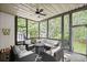 Screened-in porch offering an inviting view to a tree-filled yard at 3648 Sope Creek Farm Se, Marietta, GA 30067