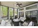 Comfortable screened porch with seating and ceiling fan at 3648 Sope Creek Farm Se, Marietta, GA 30067