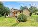 A cozy two-story home featuring a lattice-covered porch, brick fireplace and expansive backyard at 423 Mephisto Cir, Lawrenceville, GA 30046