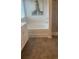 Bright bathroom featuring a soaking tub and shower with tile flooring at 1028 Merritt Dr # 15, Villa Rica, GA 30180