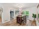 Dining room with a view of the kitchen and outdoor deck access at 1720 Little Willeo Rd, Marietta, GA 30068
