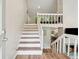 Bright entryway featuring a staircase and wood flooring at 1720 Little Willeo Rd, Marietta, GA 30068