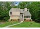 Charming home with a well-manicured lawn, stone accents and mature trees at 1720 Little Willeo Rd, Marietta, GA 30068