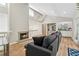 Bright living area featuring a fireplace, built-in shelving, and an adjacent bar area perfect for entertaining at 1720 Little Willeo Rd, Marietta, GA 30068
