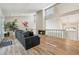 Open living area with fireplace, wooden floors, and a second-story balcony overlooking the space at 1720 Little Willeo Rd, Marietta, GA 30068