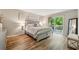 Main bedroom with wood flooring and access to the deck at 1720 Little Willeo Rd, Marietta, GA 30068