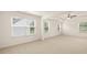 Spacious bedroom with large windows and a ceiling fan at 291 Sandy Oak Dr, Loganville, GA 30052