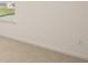 Neutral bedroom with plush carpeting and a sunlit window at 291 Sandy Oak Dr, Loganville, GA 30052