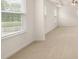 Well-lit bedroom with large windows at 291 Sandy Oak Dr, Loganville, GA 30052