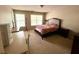 Bedroom with a king-size bed, modern furniture, and bright windows at 1560 Park Grove Dr, Lawrenceville, GA 30046
