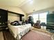 Bedroom with large windows, black furniture and a king-size bed at 1560 Park Grove Dr, Lawrenceville, GA 30046