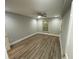 Cozy bedroom featuring hardwood floors, a ceiling fan, and fresh paint at 3117 Colonial Way # G, Atlanta, GA 30341