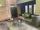 A quaint outdoor patio featuring a cozy seating area with comfortable furniture at 3117 Colonial Way # G, Atlanta, GA 30341