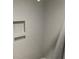 Close up of the shower with a built in nook and gray tiling at 3117 Colonial Way # G, Atlanta, GA 30341