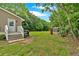 Spacious backyard featuring a shed and a patio leading to the back entrance of the home at 104 Gilreath Rd, Cartersville, GA 30121