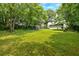 View of the sprawling backyard with storage shed, offering outdoor space at 104 Gilreath Rd, Cartersville, GA 30121