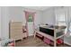 bedroom with bunk bed, dresser, and window with natural light at 104 Gilreath Rd, Cartersville, GA 30121