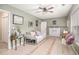 Bedroom with wood floors, daybed, sitting bench, and decor at 270 Meadow View Dr, Grayson, GA 30017